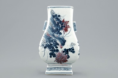A Chinese blue and underglaze red fanghu shape wall vase, 19th C.